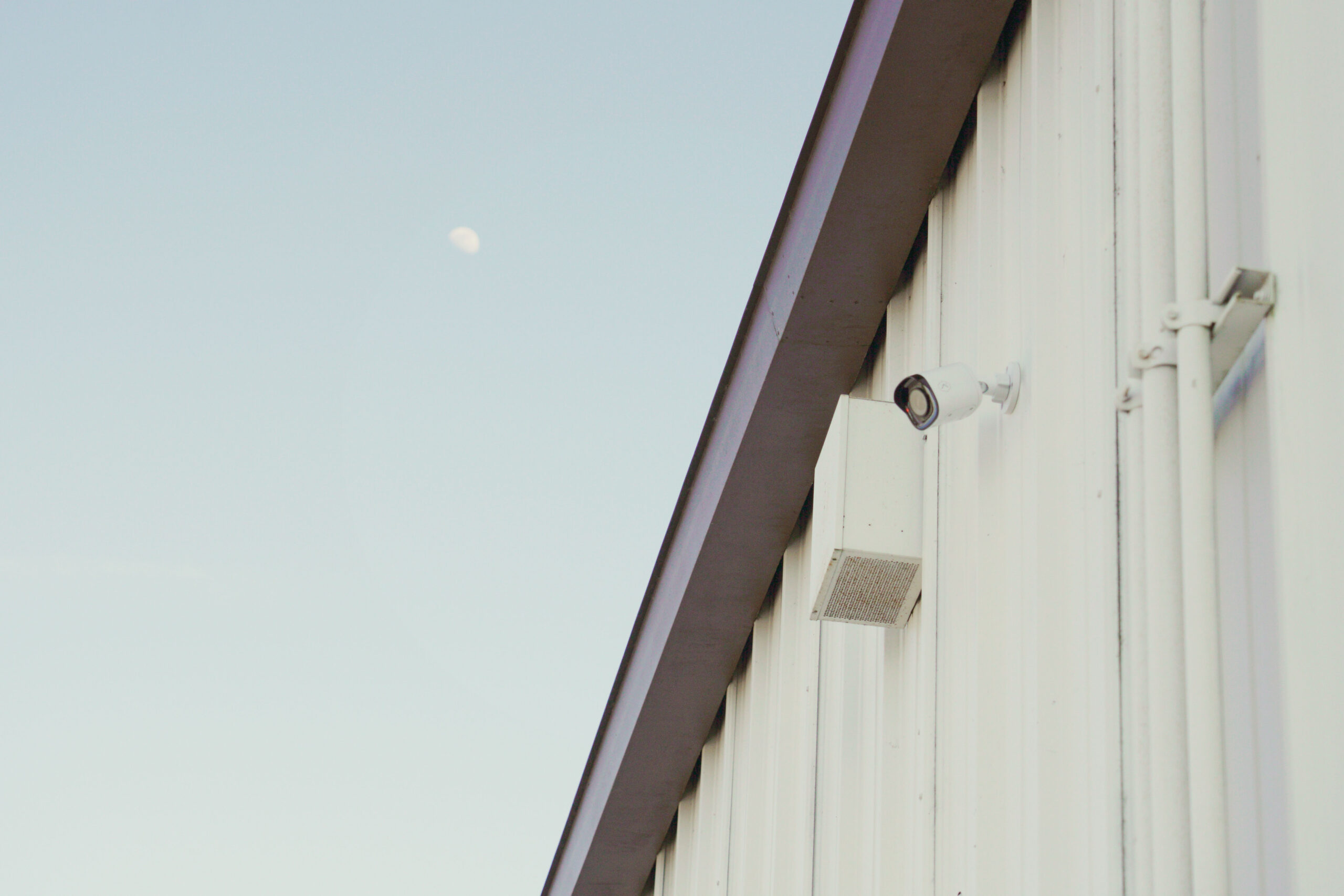 Professional security cameras installed on commercial building