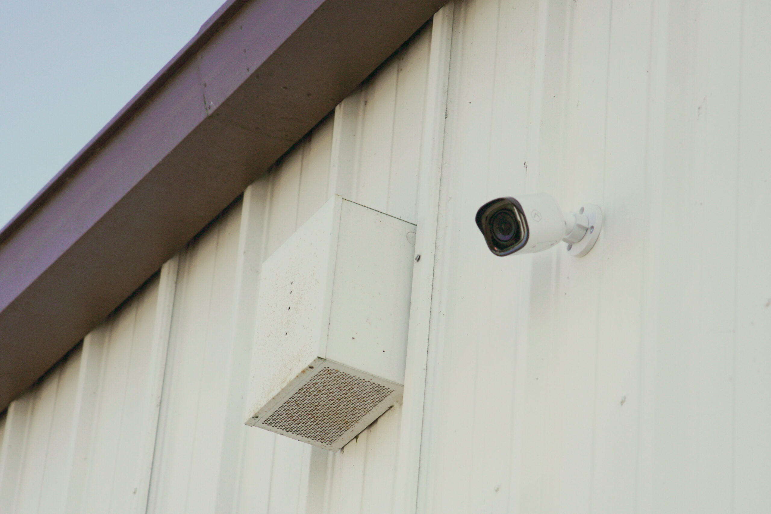 Exterior security camera on commercial building